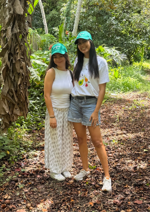 Green Tomato Market team member visiting local Florida farm and connecting with a farmer in the field