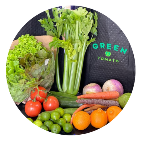Fresh seasonal vegetables including celery, tomatoes, carrots, lettuce and citrus from Florida farms, delivered by Green Tomato Market